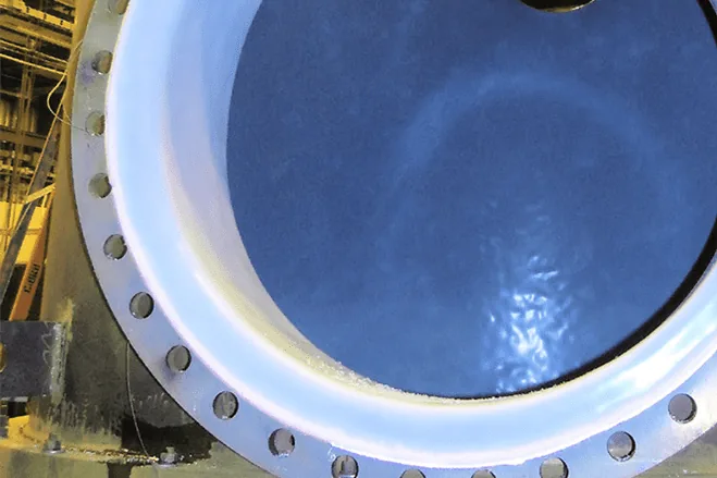 Fluoropolymer-lined flange